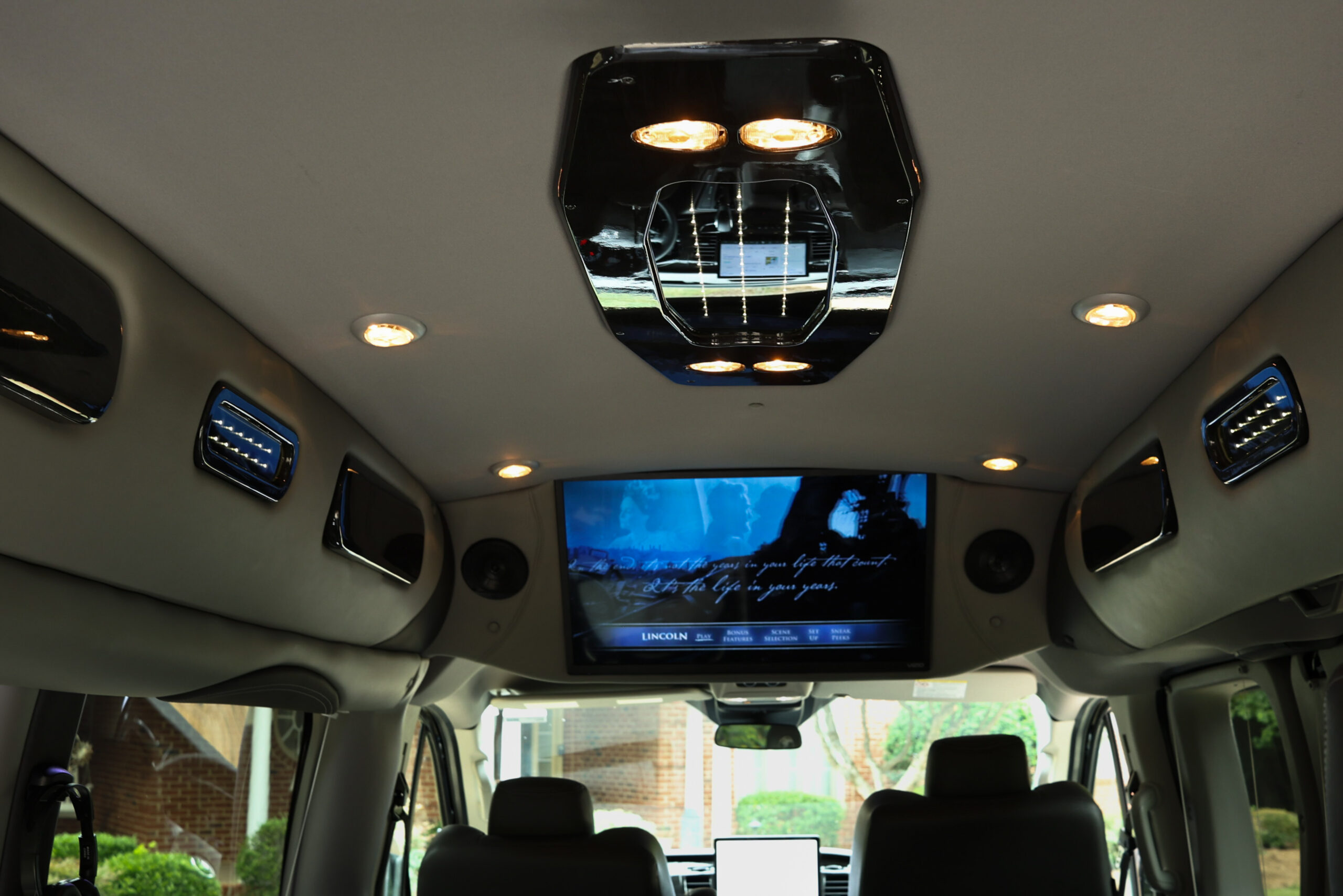 Minivan with car seat, ideal for safe long-distance medical transport.