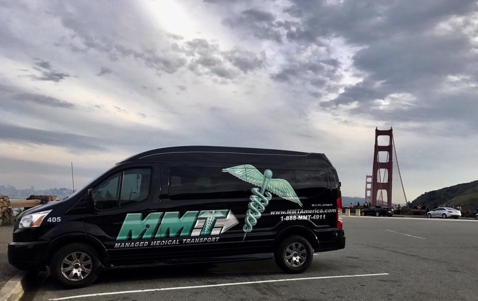 The image features a compact van, which is essential for managed medical transport services. This vehicle type is ideal for long-distance medical transport, ensuring safe and efficient transportation for patients.